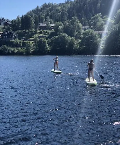 Luxury tent Glamping On Idyllic Lake, Paddle Boards & Rowboat